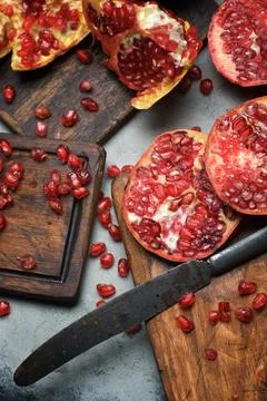 Pomegranates on a table Fotos de archivo