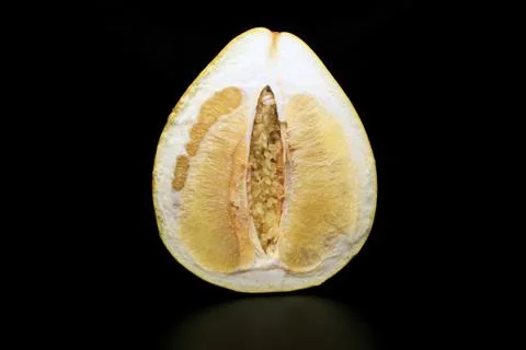 Pomelo on a black background Stock Photos