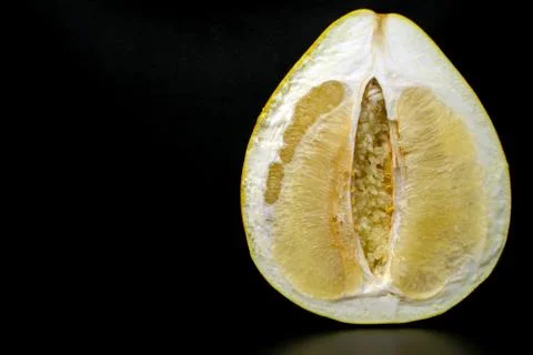 Pomelo on a black background Stock Photos
