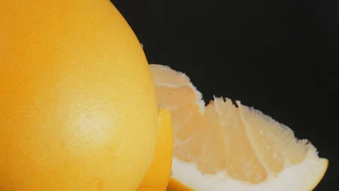 Pomelo fruit, orange lith pulp rotating closeup Stock Footage 121707074