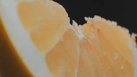 Pomelo fruit, orange lith pulp rotating closeup, beautiful macro Stock Footage 121707746