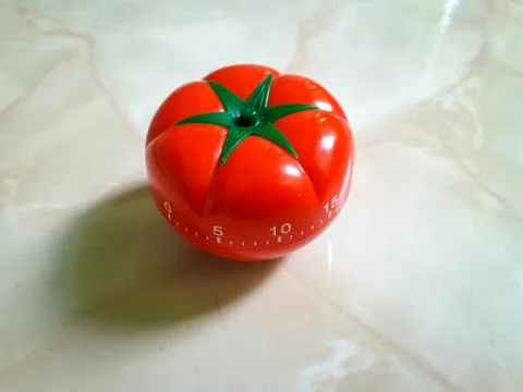 Pomodoro Timer in old paper texture at center. Stock Photos