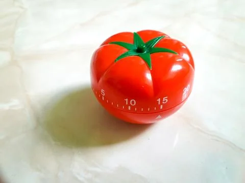 Pomodoro Timer in old paper texture at center. Stock Photos