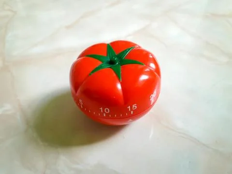 Pomodoro Timer in old paper texture at center. Stock Photos