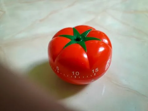 Pomodoro Timer in old paper texture at center. Stock Photos