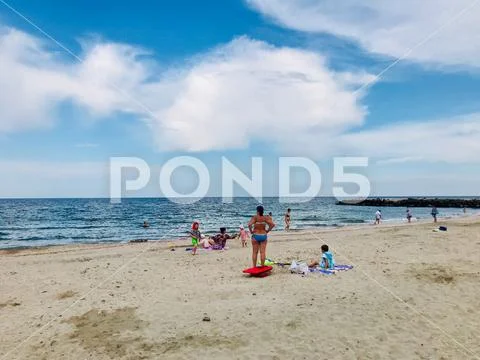 Pomorie, Bulgaria - June 05, 2018: View of the people spending time on the be Stock Photos
