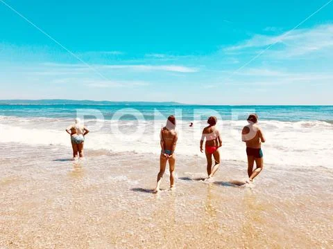 Pomorie, Bulgaria - May 30, 2018: View of the people spending time on the bea Stock Photos