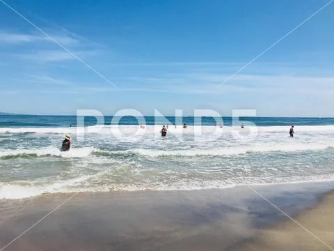 Pomorie, Bulgaria - May 30, 2018: View of the people spending time on the bea Stock Photos