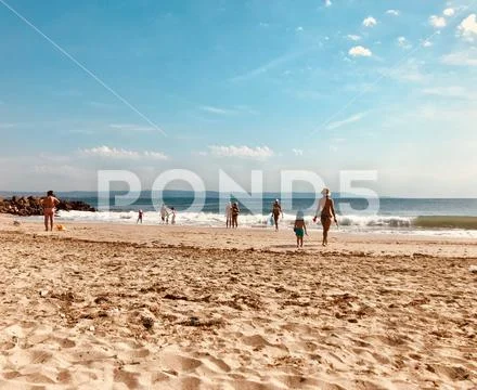 Pomorie, Bulgaria - May 30, 2018: View of the people spending time on the bea Stock Photos