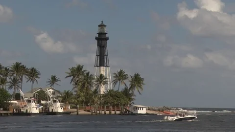 Pompano Beach Lighthouse with Boat Passing Video stock 76757298