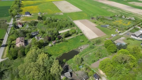 Pond and fields in Boreczno Stock Footage 307680212