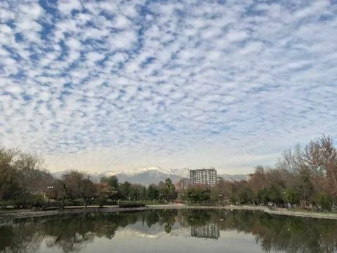 Pond and reflection of clouds at a park in Santiago, Chile Fotos Stock