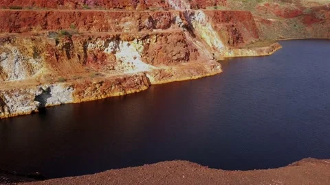 Pond with contaminated waters of an old copper mine. environmental hazard Stock Footage 154406608