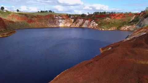 Pond with contaminated waters of an old copper mine. environmental hazard Stock Footage 154406636