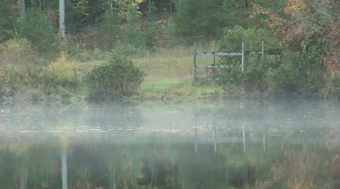 Pond in Fall mist rising close up Stock Footage 567415