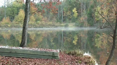 Pond in Fall with mist rising Stock Footage 567460