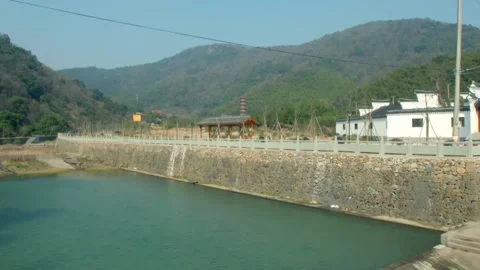 Pond next to the temple in the mountains Stock Footage 235134675