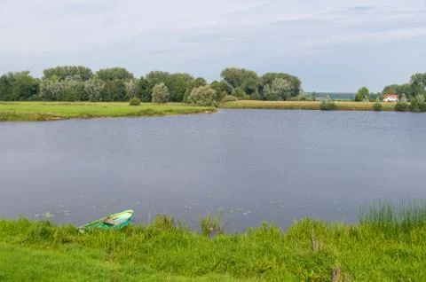 Pond with rowing boat Stock Photos