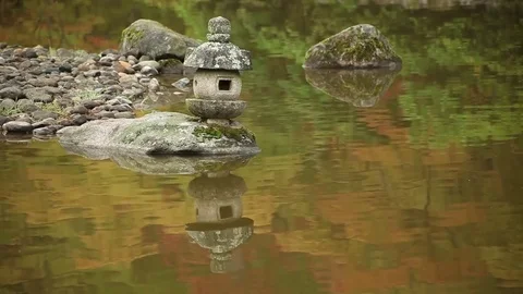 Pond with sculpture 3 Stock Footage 77258713