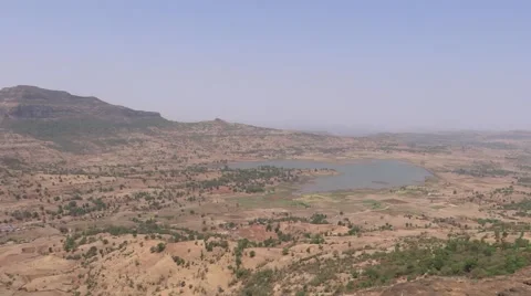 Pond Surround by Hills Stock Footage 50154654