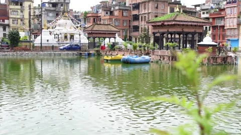 Pond Surrounded by Temples Stock Footage 284377569