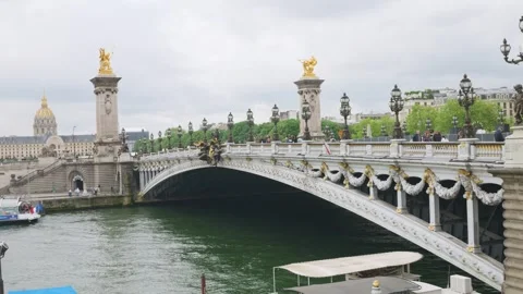Pont Alexandre III bridge over the Seine River and the House of Invalides. Stock Footage 310183109