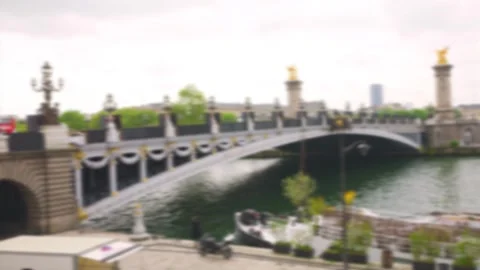 Pont Alexandre III bridge over the Seine River, the embankment and a moored boat Stock Footage 310833567