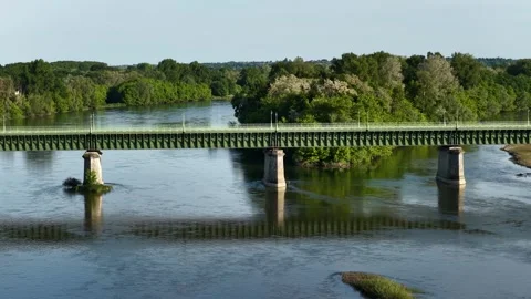 The Pont Canal bridge spanning across a river in Briare, France. The bridge is Stock Footage 346666734