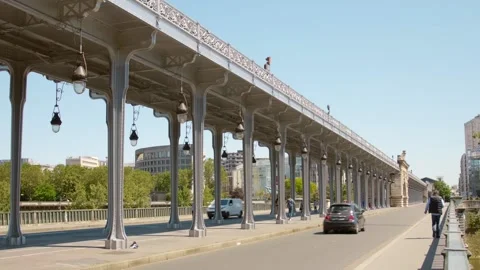 Pont de Bir-Hakeim bridge with metallic pillar and road in Paris, France. Stock Footage 161772683