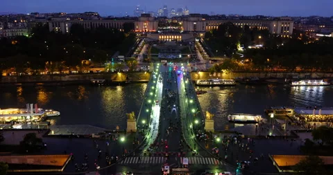 Pont d'Iéna and Palais de Chaillot at blue hour, with the La Défense skyline Stock Footage 328524977