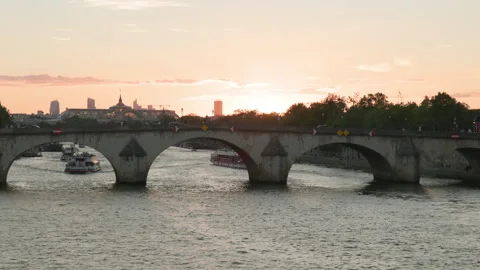 Pont Royal Stone Arches with Distant Grand Palais at Sunset, Paris Stock Footage 339190947