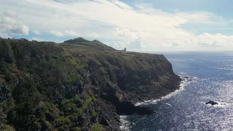 Ponta da Ferraria Beach. Drone shot showing the lighthouses and ocean Stock Footage 320074685