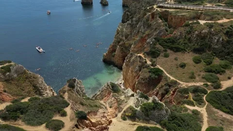 Ponta-da-Piedade-Beach-Kayaks-Boats-Drone-07 Vídeo Stock 338031345