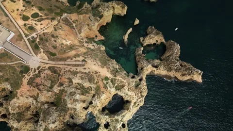 Ponta-da-Piedade-Limestone-Textures-Sea-Boat-14 Stock Footage 338031500