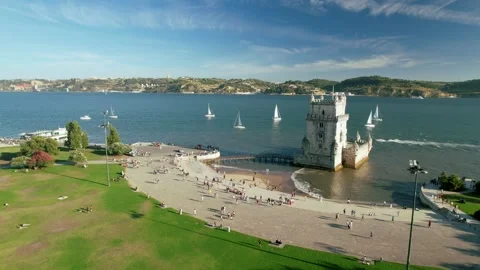 From Ponte 25 de Abril to Belem Tower Pan in Lisbon, Portugal. Video stock 250179093