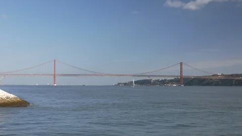 The Ponte 25 de Abril -  Bridge in Lisbon Portugal. Stock Footage 104925317