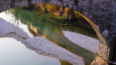 Ponte del diavolo, Arch devil bridge in Cividale, romanic bridge on sunset Stock Footage 111921100