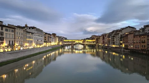 Ponte Vecchio bridge over the Arno river in Florence at night Stock Footage 338002994
