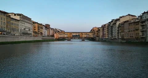 Ponte Vecchio in Florence, Sunset along river aerial Stock Footage 272458192