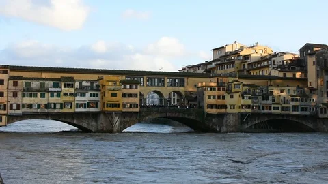 The Ponte vecchio is a medieval  bridge over the Arno River, in Florence, Italy. Stock Footage 122324674