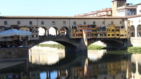 The Ponte Vecchio is an old medieval bridge over the Arno River in Florence. Stock Footage 98155854