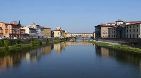 Ponte Vecchio - Wide with glassy Arno River and reflection, Florence, Italy Stock Footage 10789874