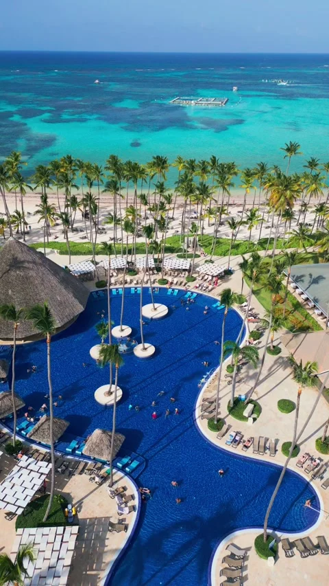 Pool at All-Inclusive Resort Barcelo in Punta Cana , Caribbean. Aerial View Stock Footage 314530842