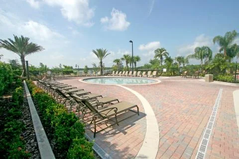 Pool and chairs Stock Photos