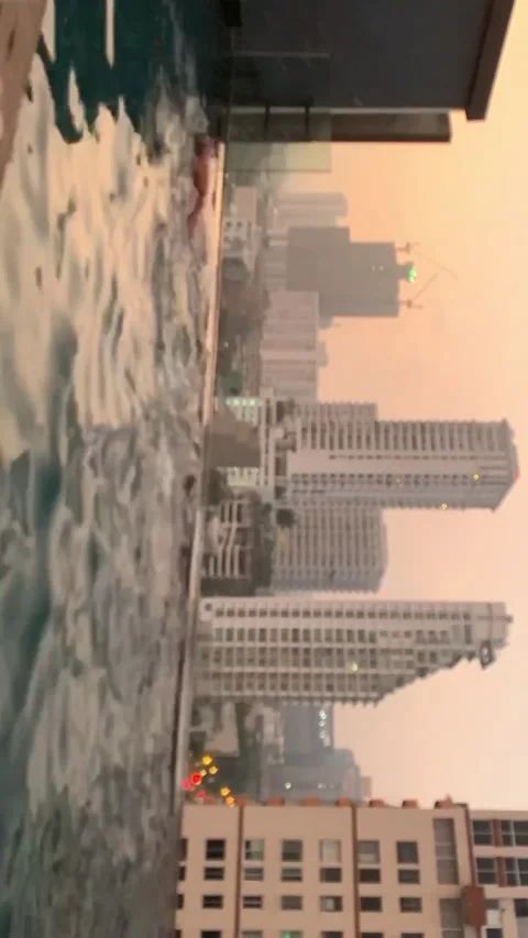 Pool and City Side Ways Vertical 720p Stock Footage 179676915