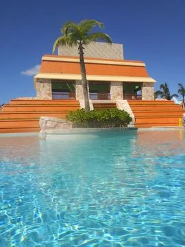Pool and tropical temple Stock Photos