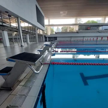 The pool area has been prepared for the swimming competition Stock Photos