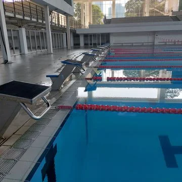 The pool area has been prepared for the swimming competition Stock Photos