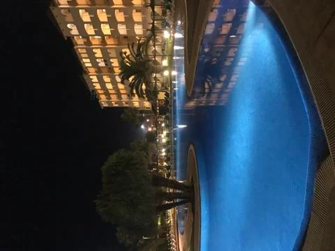 Pool area in the night Stock Photos