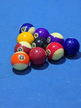 Pool balls on blue felt Photos